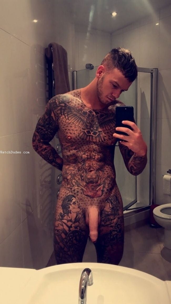 Tattooed nude man taking a selfie - Nude Boy Pictures